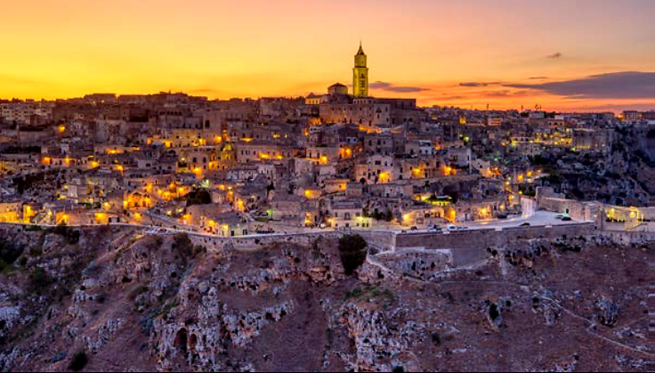 Panoramic sunset view of the Sassi cave dwellings in Matera, UNESCO World Heritage Site in southern Italy