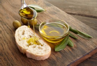 Extra virgin olive oil tasting at a historic olive farm near Ostuni, the White City of Puglia, Italy