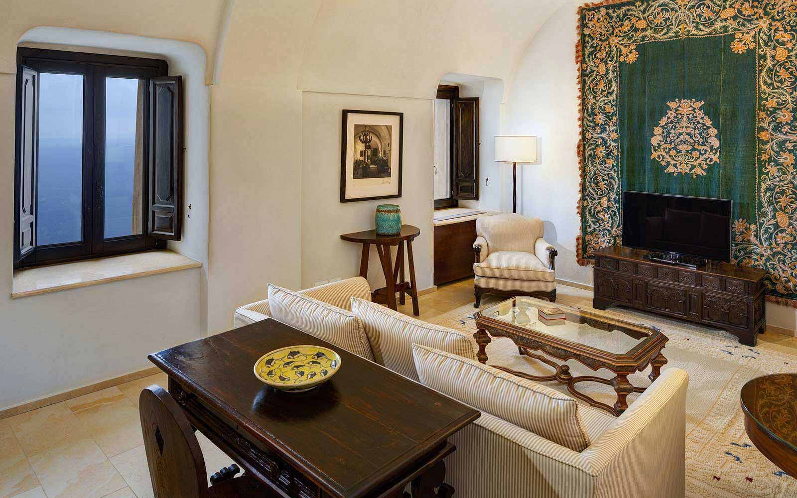 Deluxe suite living area at Monastero Santa Rosa