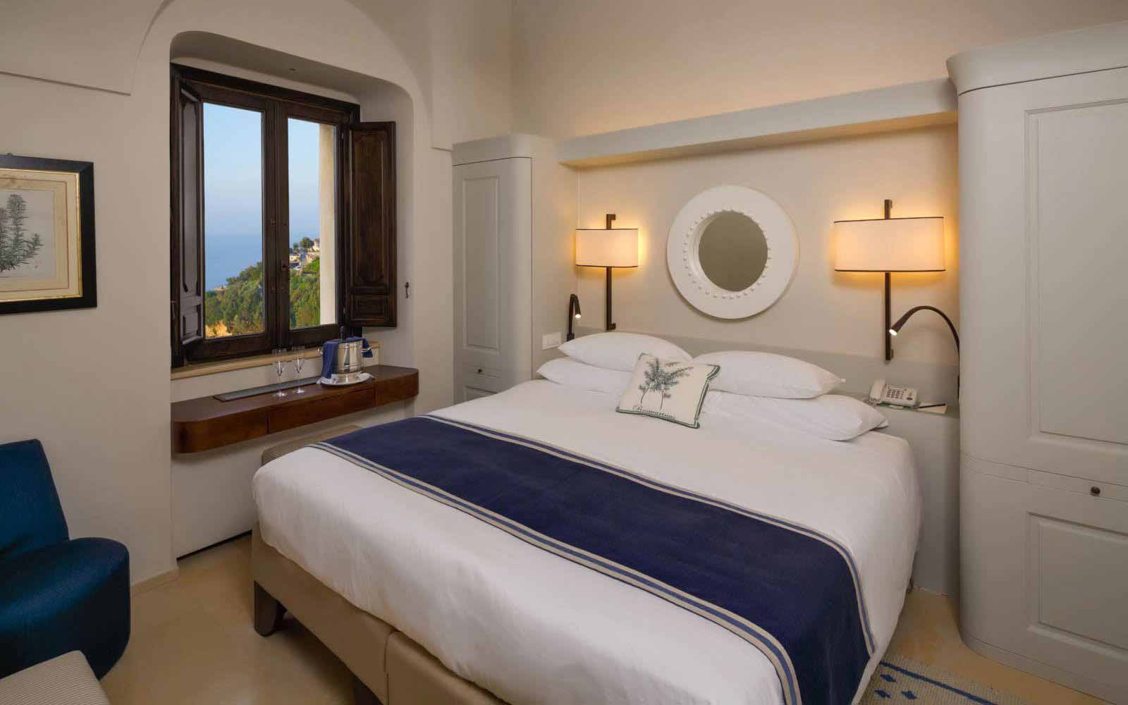 Deluxe bedroom at Monastero Santa Rosa